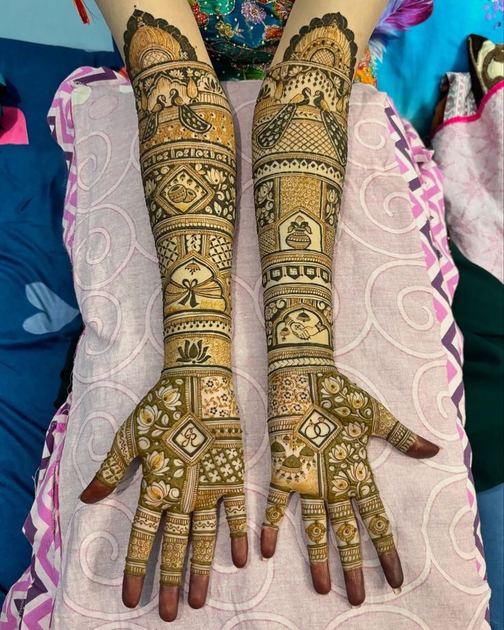 Bridal mehndi with peacock, kalash and lotus panels